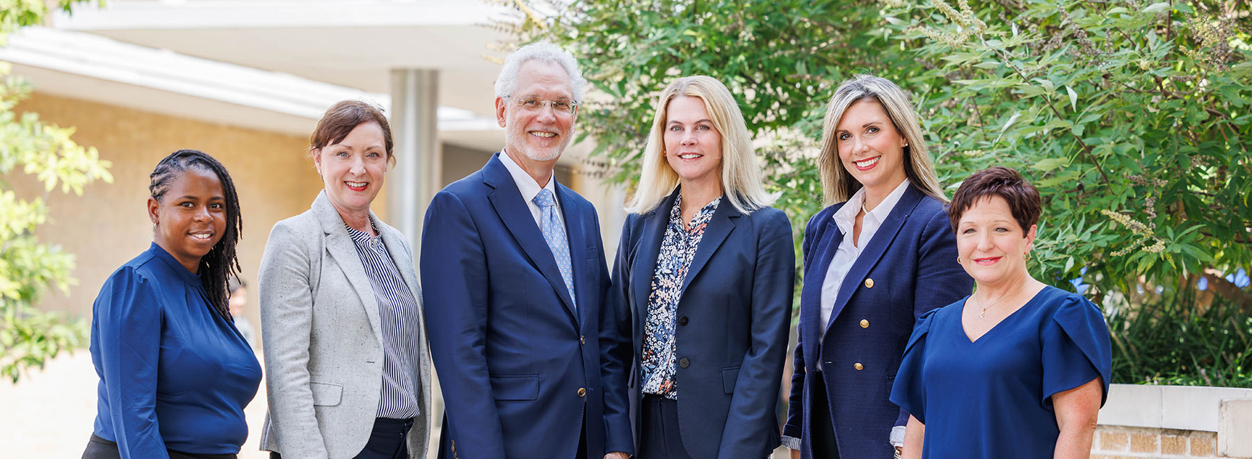Outdoor group picture of six Faculty Affairs staff members.